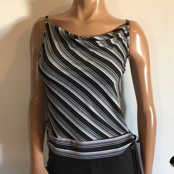 Black and white top. Tie at the hip for looks. Size small - Picture 1 of 4